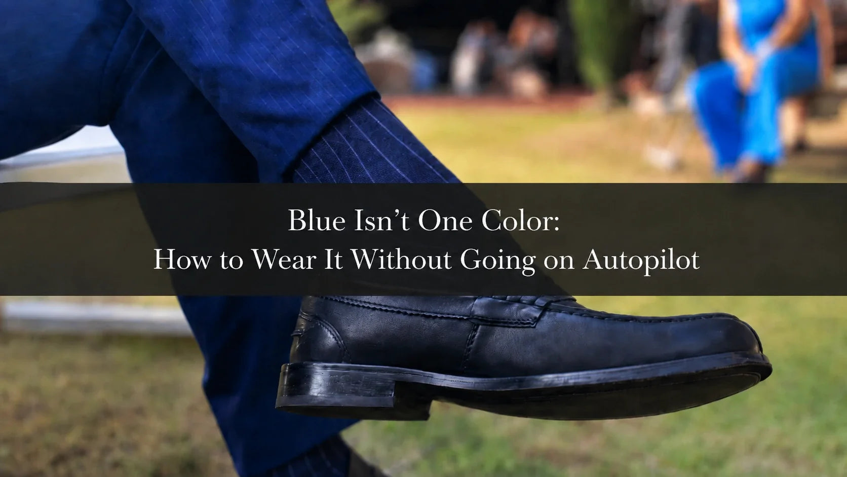 Detail of a black loafer with a blue sock and blue trousers, with text about how to style blue without default pairings.