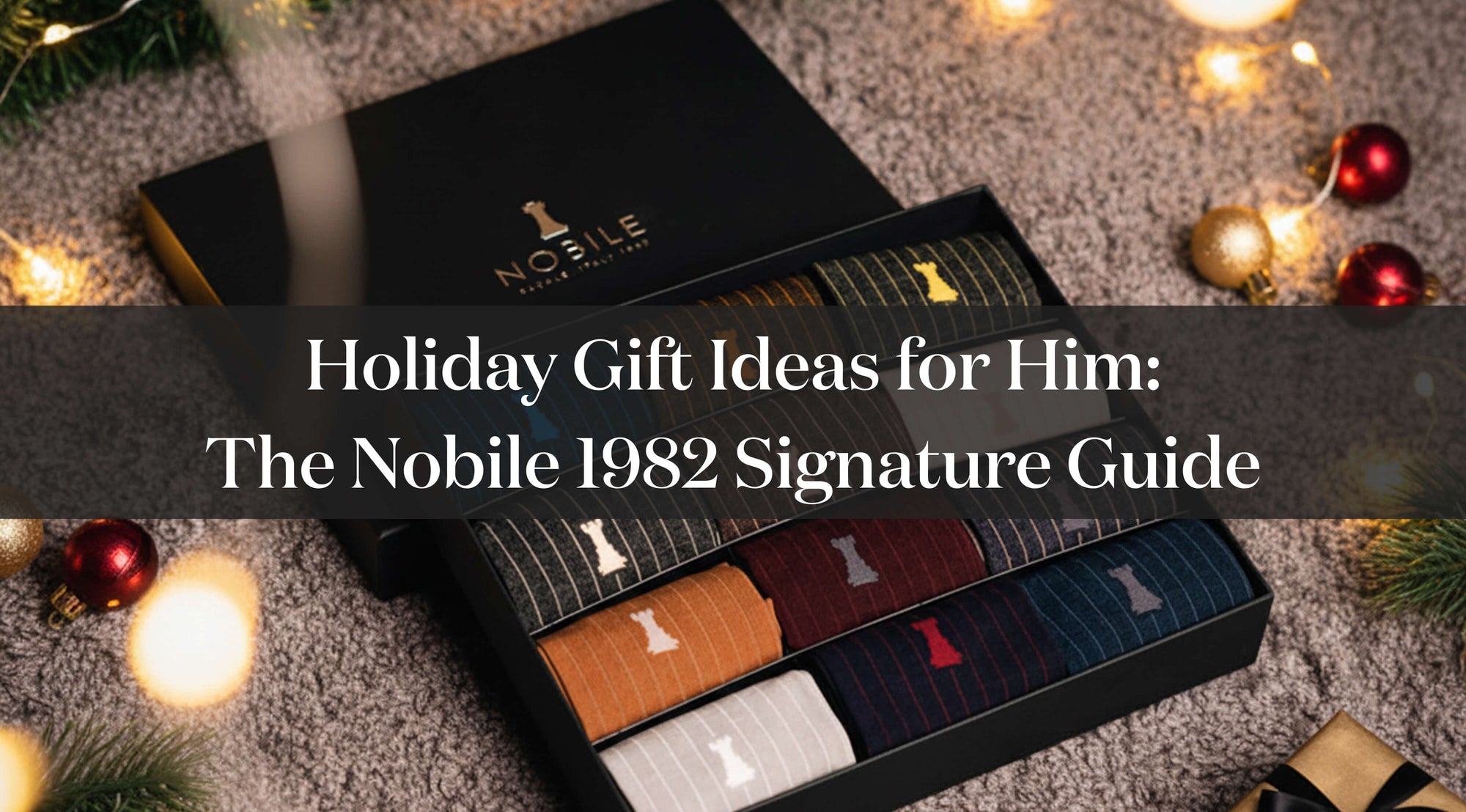 Cover_articolo-blog_idee_regalo_natale_uomo_la_guida_firmata_nobile_1982_calze