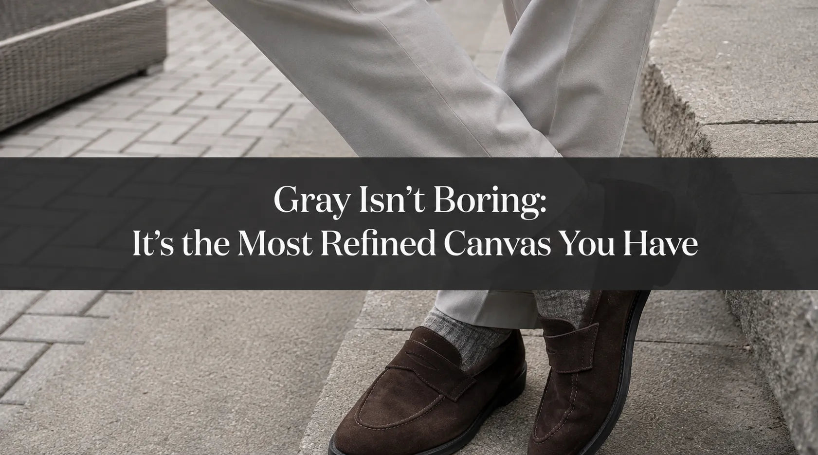 Light gray trousers with brown loafers and contrasting socks, cover image for the men’s guide to styling gray.