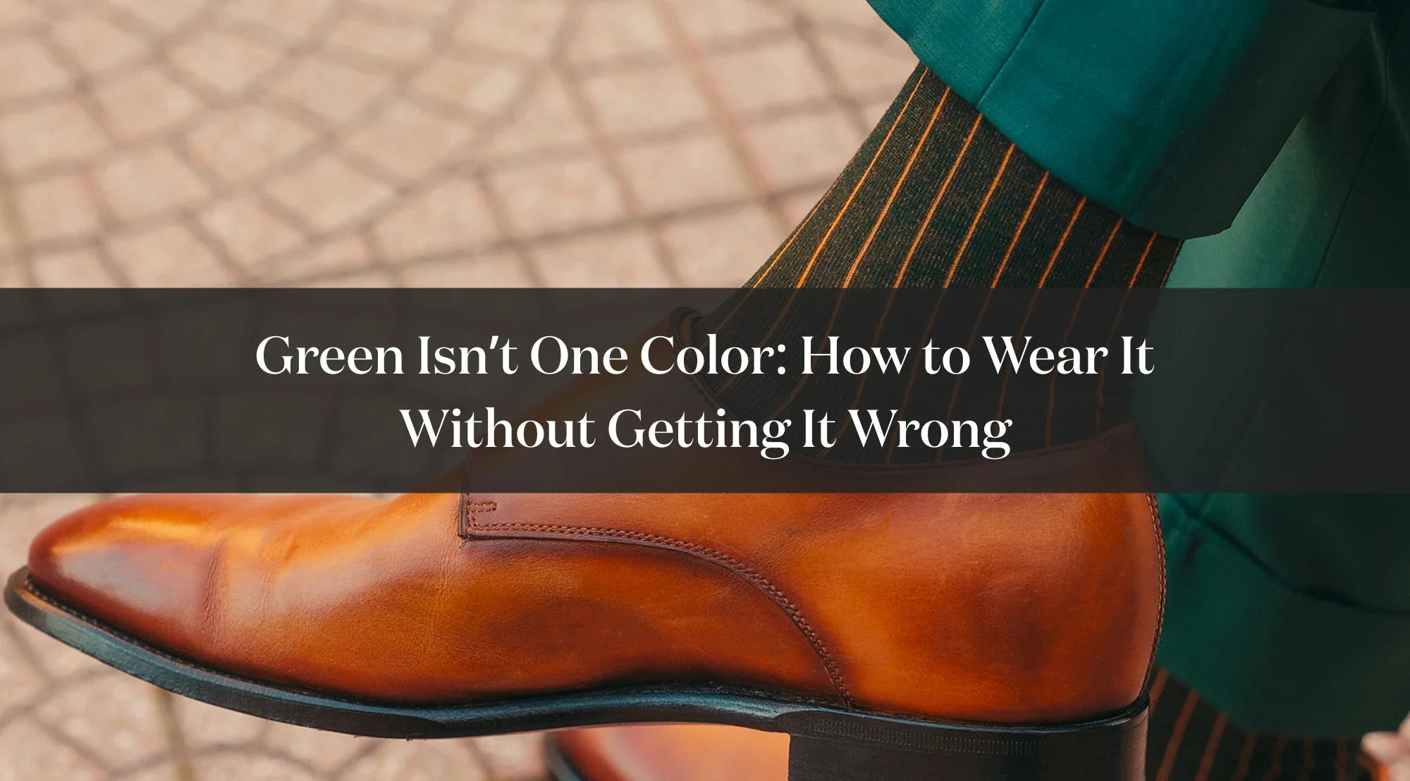 Detail of a tan dress shoe with a striped green sock and green trousers, with text about how to style green.