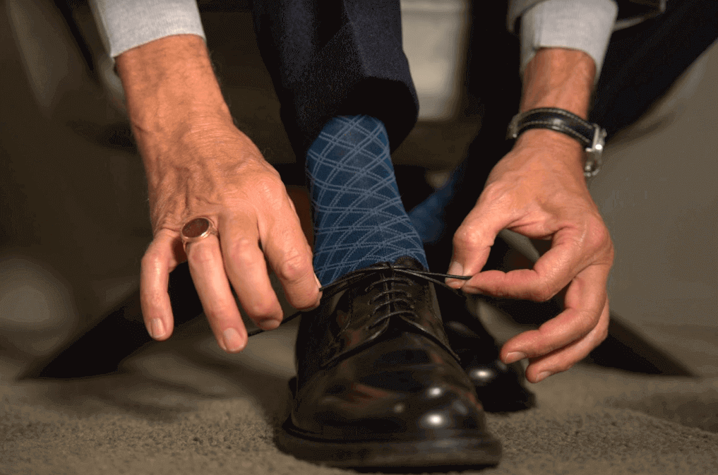 Calze di lusso da uomo: storia, segreti e tendenze